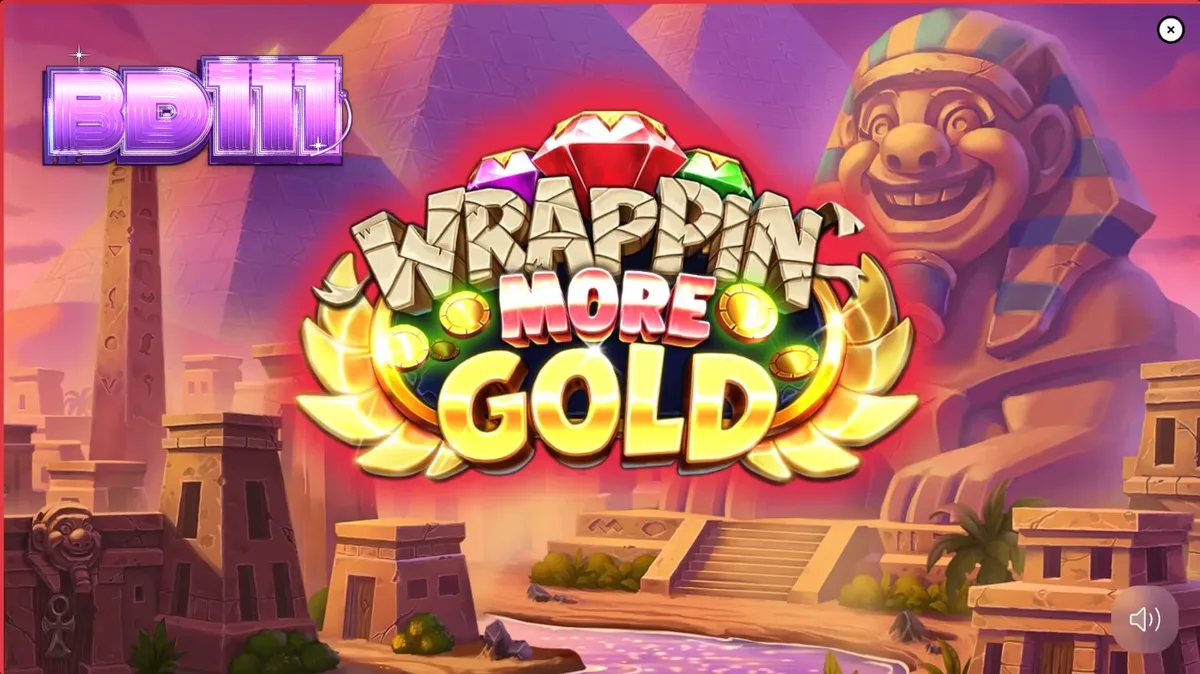Wrappin’ More Gold স্লট গেমের একটি দৃশ্য যেখানে বন্ধুত্বপূর্ণ মমি এবং রঙিন রিল দেখা যাচ্ছে।